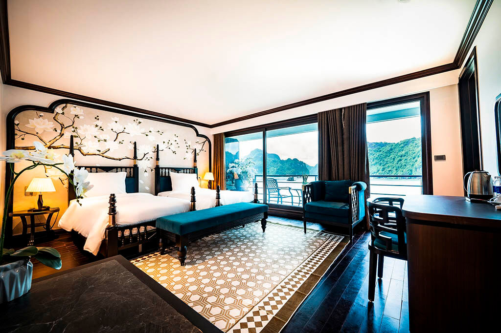 Experience serenity as you sail through Halong Bay’s limestone wonders